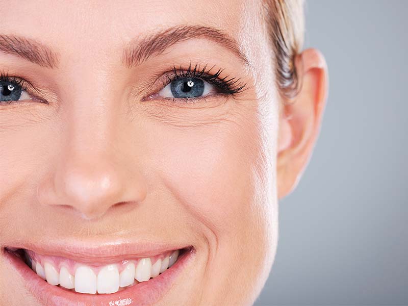 Adult patient smile restored with a dental implant
